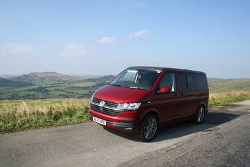 A campervan in the Yorkshire dales as a family take a summer holiday to different Yorkshire destinations 